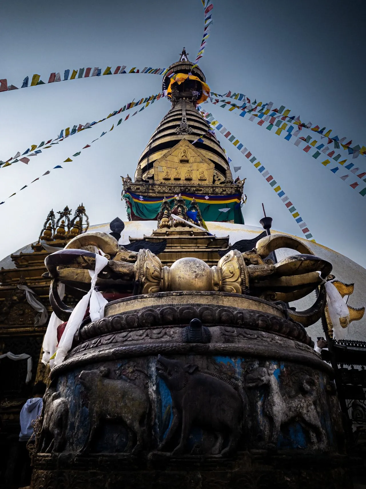 Swayambhunath Monkey Temple stupa spire and bronze Vajra monument in Nepal.